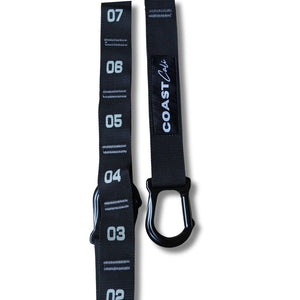 Black strap with numbered markers and 'Coast Cali' branding on a white background